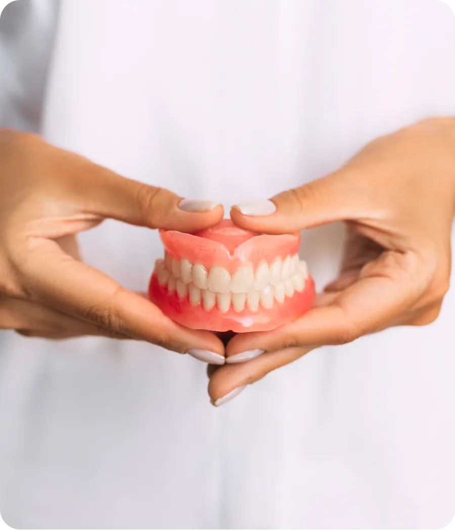Complete dentures on a dental model